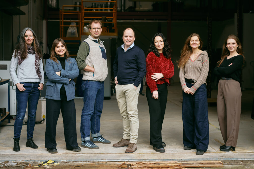 NOOSA team in front of extrusion line